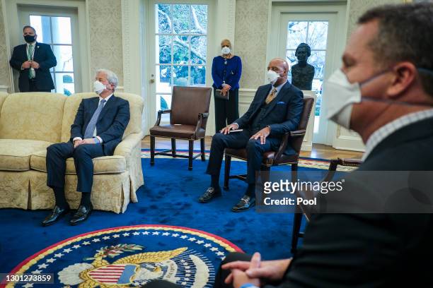 Jamie Dimon, Chairman and CEO of JPMorgan Chase, Marvin Ellison, President and CEO of Lowe’s Companies and Doug McMillon look on as President Joe...