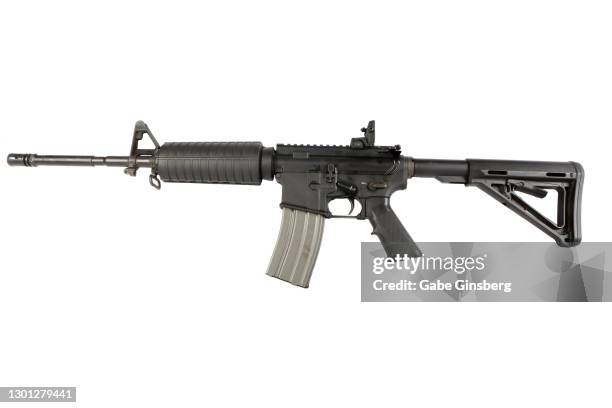 m4 carbine on white background - vuurwapen stockfoto's en -beelden