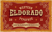 A vintage serif font in western style.