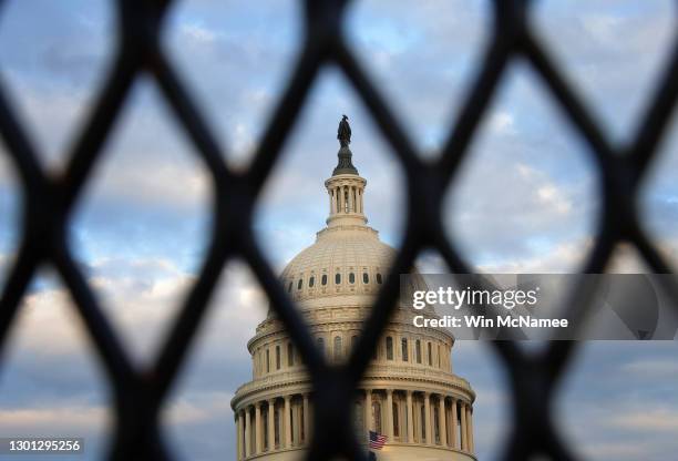 The U.S. Capitol is shown as members of the U.S. Senate listen to opening arguments from House impeachment managers and attorneys representing former...