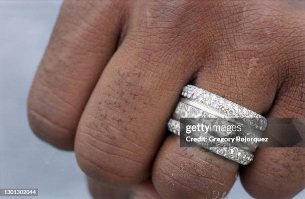Superstar, Kobe Bryant shows off his jewelry on September 8th, 2002 in Beverly Hills, California.