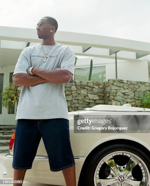 Superstar, Kobe Bryant poses with his Bentley on September 8th, 2002 in Beverly Hills, California.