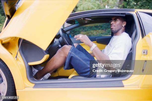 Superstar, Kobe Bryant poses with his Lamborghini on September 8th, 2002 in Beverly Hills, California.