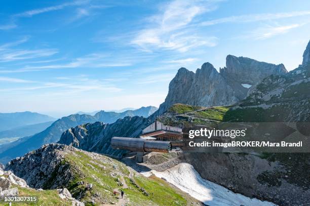 view of karwendel mountain restaurant and karwendelbahn with northern, middle and southern karwendelkopf, mittenwalder hoehenweg, karwendel mountains, mittenwald, bavaria, germany - karwendel stock pictures, royalty-free photos & images