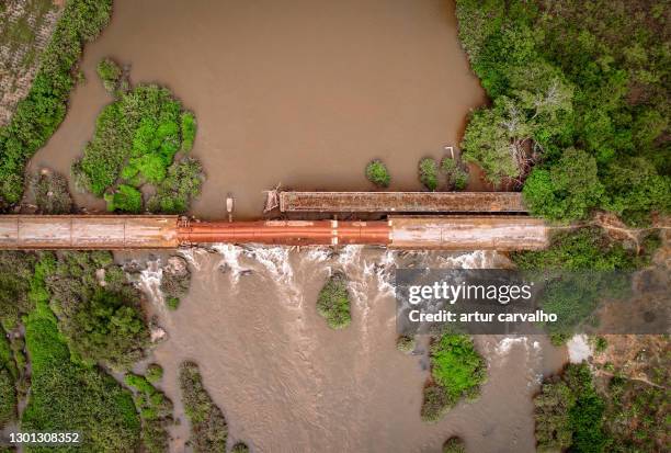 ruins of a bridge in rural angola, bengo province - civil war angola stock pictures, royalty-free photos & images