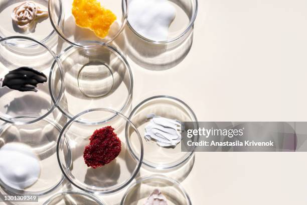 cosmetics beauty skin care product on transparent plate. - descascado imagens e fotografias de stock