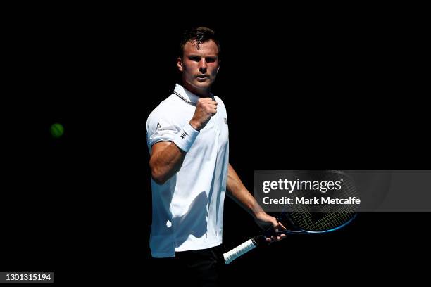 Marton Fucsovics of Hungary celebrates after winning a point in his Men's Singles second round match against Stan Wawrinka of Switzerland during day...