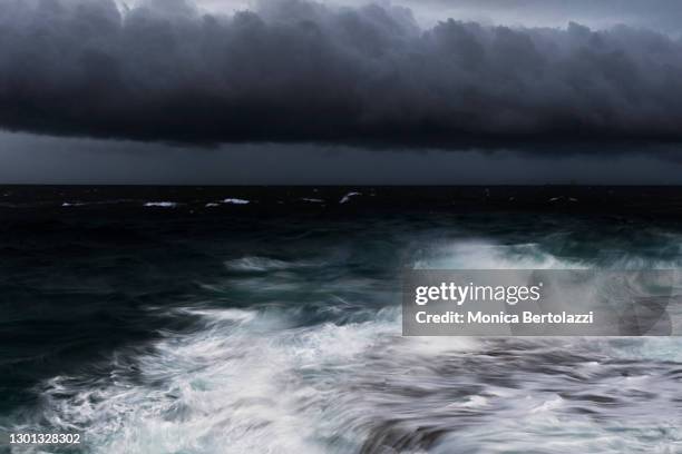 storm over the ocean - squall stock pictures, royalty-free photos & images