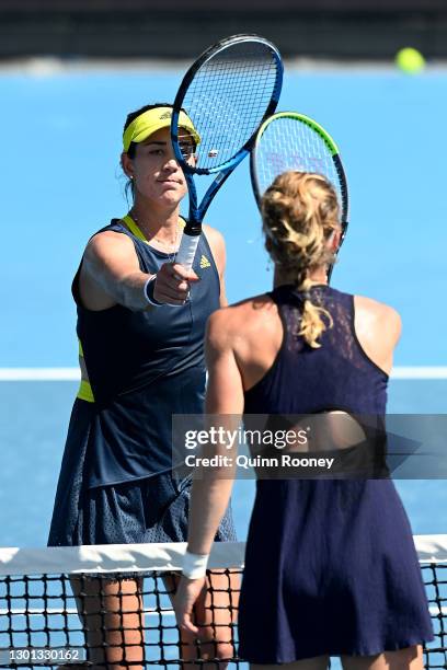 Garbine Muguruza of Spain celebrates after winning match point in her Women's Singles second round match against Liudmila Samsonova of Russia during...