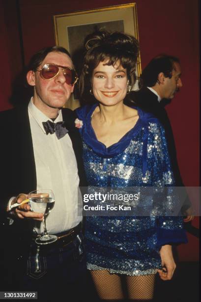 Liberation Nightlife chronicler Alain Pacadis and Elli Medeiros attend a Party at Le Palace Club on 1985 in Paris, France.