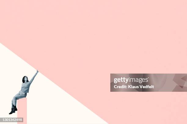 young woman on column touching coral ceiling - womens rights stock pictures, royalty-free photos & images