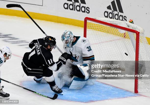 Los Angeles, CA Anze Kopitar of the Los Angeles Kings scores past goalie Martin Jones of the San Jose Sharks during the second period of a NHL hockey...