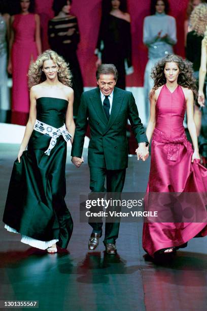 Carmen Kass, fashion designer Valentino Garavani and Gisele Bundchen walk the runway during Valentino Ready to Wear Fall/Winter 1999-2000 fashion...