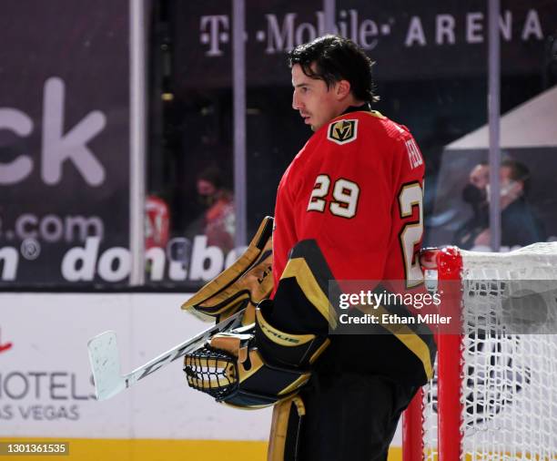 Marc-Andre Fleury of the Vegas Golden Knights stands on the ice as the American national anthem is performed before the team's game against the...