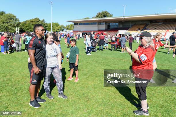 Sevu Reece poses for photos with fans during the Crusaders Super Rugby open fan day at Rugby Park on February 10, 2021 in Christchurch, New Zealand.