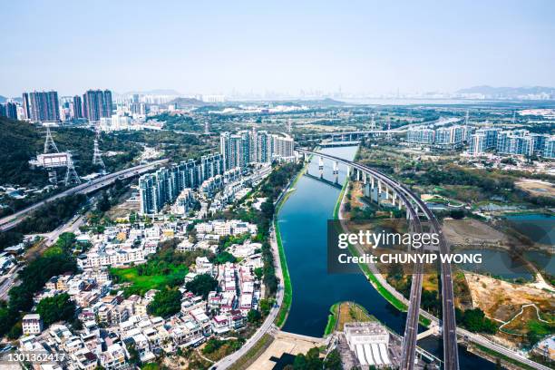 drone view of  rail line in yuen long district, hong kong - novos territórios imagens e fotografias de stock