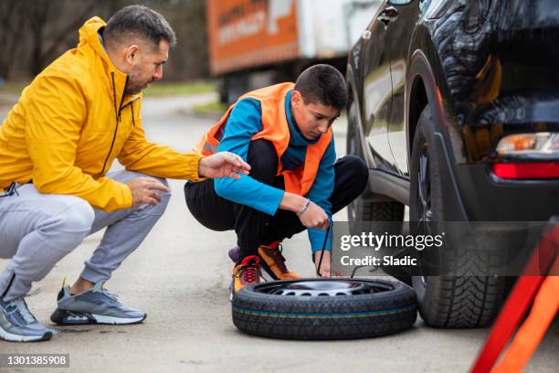 time for us - flat tyre stock pictures, royalty-free photos & images