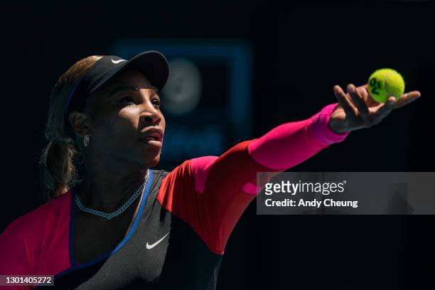 Serena Williams of the United States of America serves in her Women's Singles second round match against Nina Stojanovic of Serbia during day three...