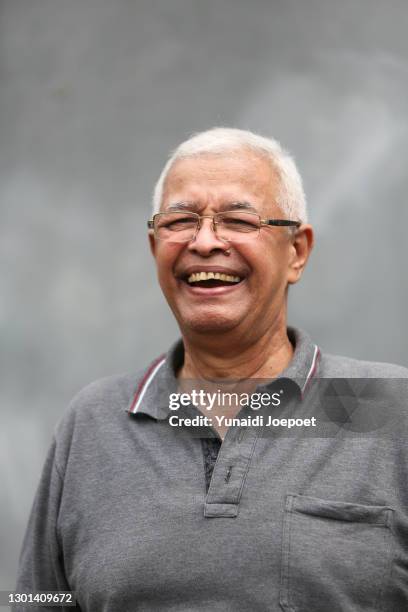 mature asian malay man smiling portrait - malay archipelago stock pictures, royalty-free photos & images