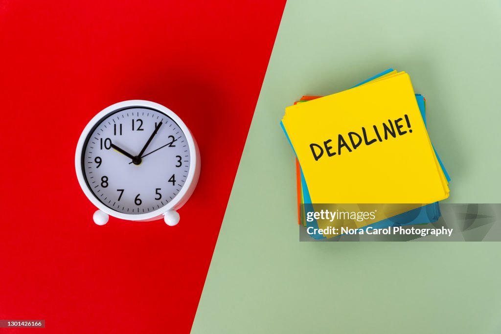 Deadline Text on Paper Note - Green and Red Background