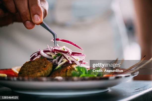 the chef is preparing falafel - falafel stock pictures, royalty-free photos & images