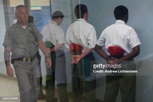 Prisoners serve their sentences at a "shock" camp prison run by the New York State Department of Corrections, in October of 2013 in rural Brocton,...