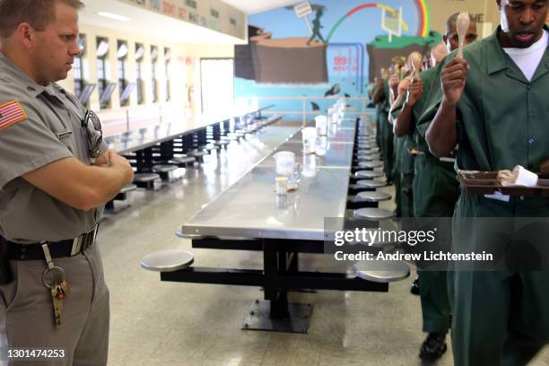 Prisoners serve their sentences at a "shock" camp prison run by the New York State Department of Corrections, in October of 2013 in rural Brocton,...