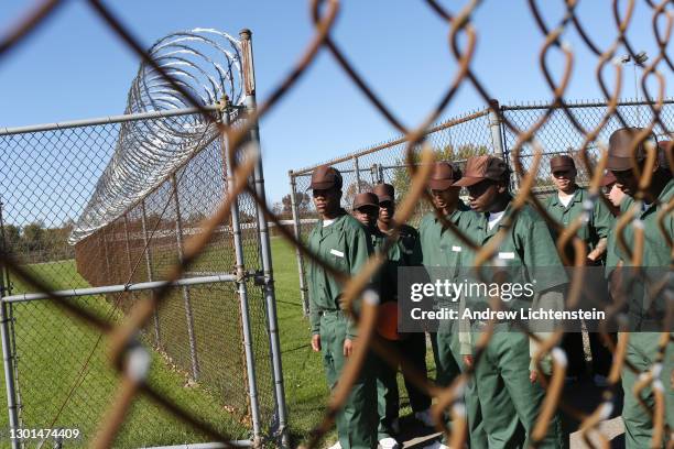 Prisoners serve their sentences at a "shock" camp prison run by the New York State Department of Corrections, in October of 2013 in rural Brocton,...