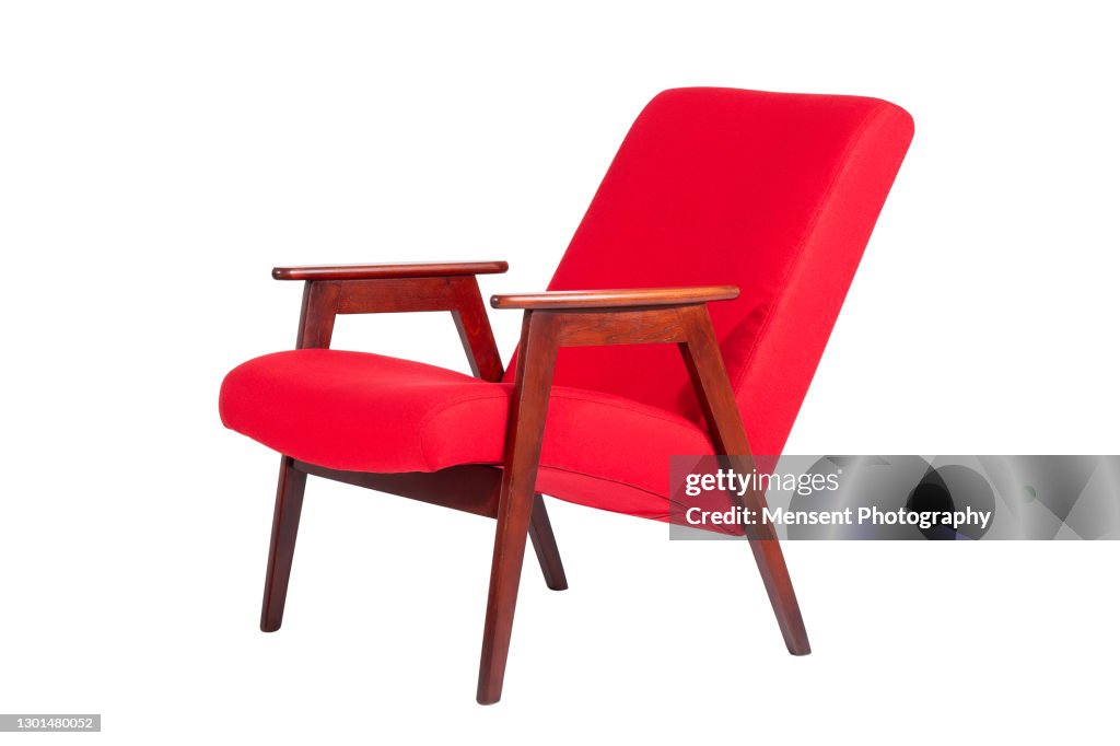 Close-Up Of Red leather and wood armchair isolated in white Background