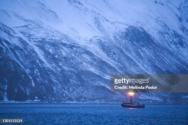 boat in the aleutian chain, near dutch harbor - aleutian islands stock pictures, royalty-free photos & images