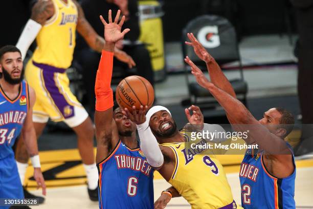Wesley Matthews of the Los Angeles Lakers is defended by Hamidou Diallo and Al Horford of the Oklahoma City Thunder at Staples Center on February 10,...
