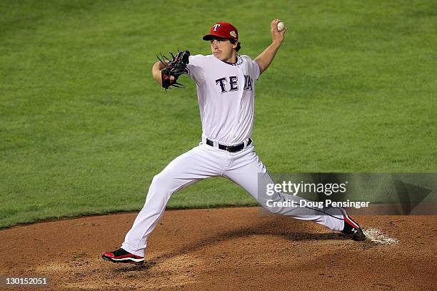 Derek Holland of the Texas Rangers pitches in the second inning during Game Four of the MLB World Series against the St. Louis Cardinals at Rangers...