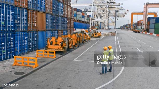 workers working at harbour - safe harbor stock pictures, royalty-free photos & images