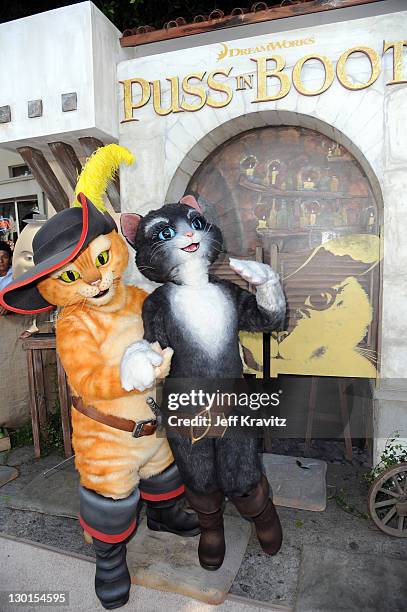 Puss in Boots and Kitty Softpaws attend the Los Angeles premiere Of "Puss In Boots" at Regency Village Theatre on October 23, 2011 in Westwood,...