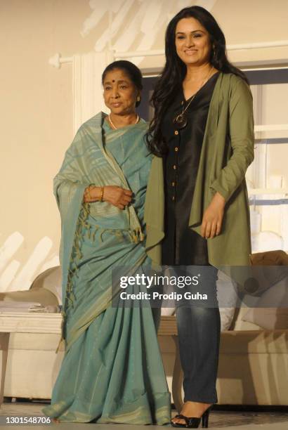 Asha Bhosle and Padmini Kolhapure attend the muhurat of the film 'Maaee' in Mumbai on April 27, 2011 in Mumbai, India