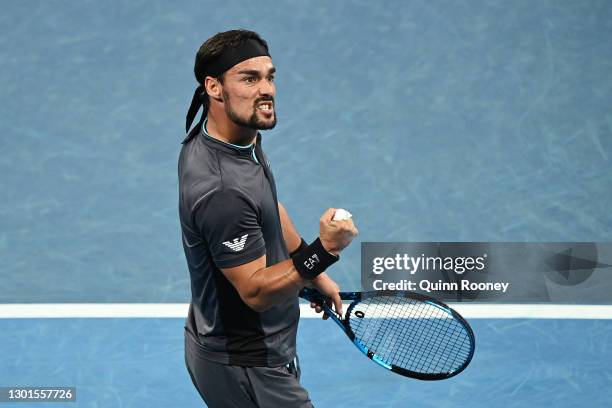 Fabio Fognini of Italy celebrates after winning a point in his Men's Singles second round match against Salvatore Caruso of Italy during day four of...