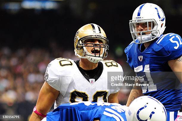 Jimmy Graham of the New Orleans Saints reacts to a first down during a game against the Indianapolis Colts being held at Mercedes-Benz Superdome on...