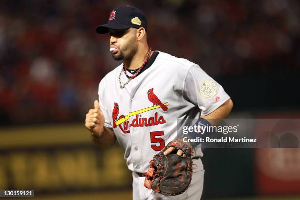 Albert Pujols of the St. Louis Cardinals walks on the field during Game Four of the MLB World Series against the Texas Rangers at Rangers Ballpark in...