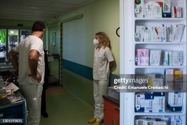 Doctor Annalisa Malara talks to a colleague in the aisle of the COVID-19 Intensive Care Unit of the Ospedale Maggiore di Lodi, during a visit to see...