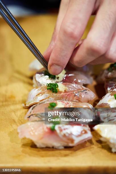 a japanese sushi chef making sushi - tokyo food stock pictures, royalty-free photos & images