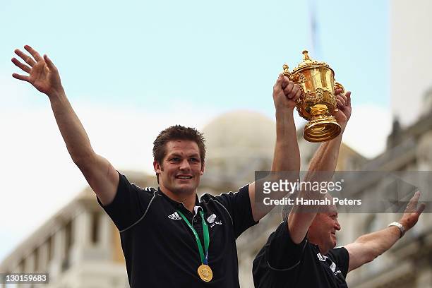 Richie McCaw and head coach Graham Henry of the All Blacks hold up the Webb Ellis Cup during the New Zealand All Blacks 2011 IRB Rugby World Cup...