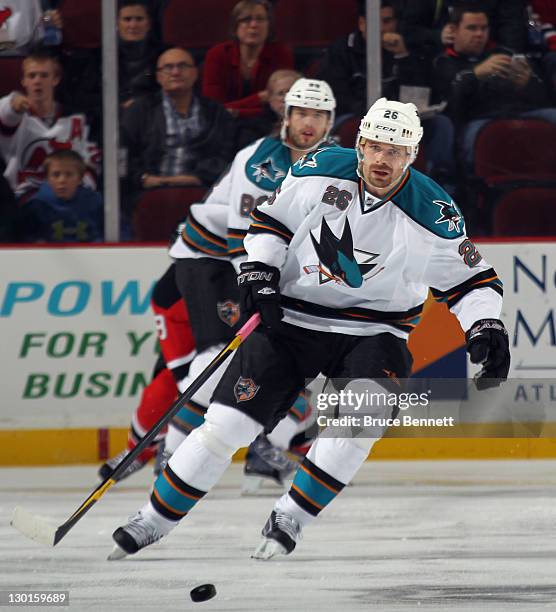 Michal Handzus of the San Jose Sharks skates against the New Jersey Devils at the Prudential Center on October 21, 2011 in Newark, New Jersey.