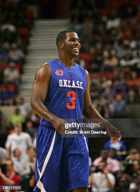 Chris Paul of Team Blue walks down court during the US Fleet Tracking Basketball Invitational charity basketball game October 23, 2011 at the Cox...