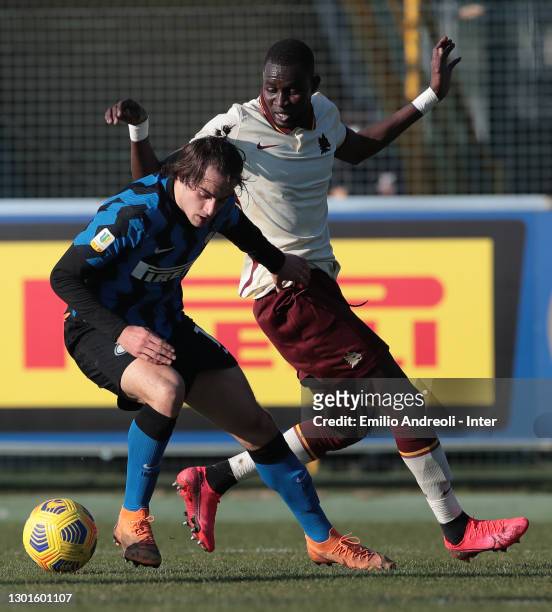 Gaetano Pio Oristanio of FC Internazionale competes for the ball with Maissa Codou Ndiaye of AS Roma during the Primavera 1 TIM match between FC...