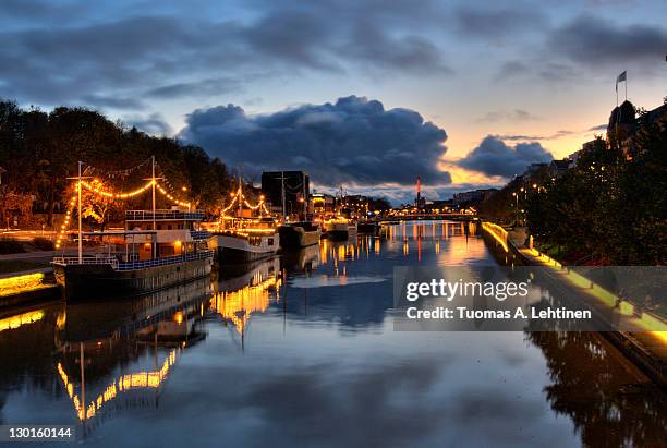 boats at river aura - turku stock-fotos und bilder