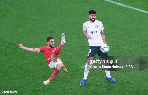 Amr El Soulia of Al Ahly SC shoots under pressure from Luan Garcia of SE Palmeiras during the FIFA Club World Cup Qatar 2020 3rd Place Play off match...
