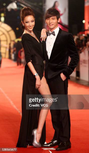 Sonia Sui and James Wen walk on the red carpet of the 46th Annual Golden Bell Awards at Sun Yat-sen Memorial Hall on October 21, 2011 in Taipei,...