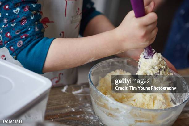 child making a cake - mixing bowl stock pictures, royalty-free photos & images