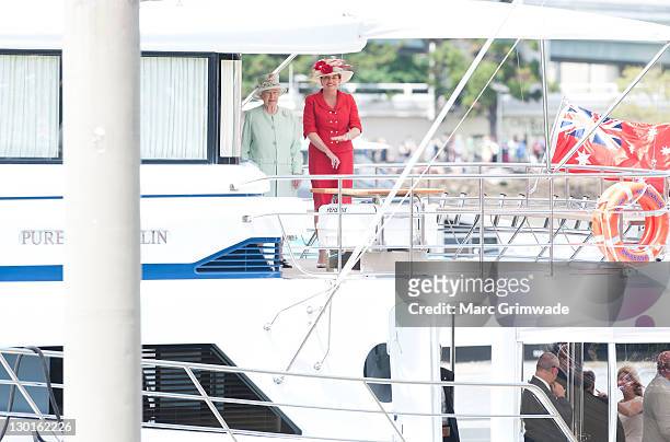 Queen Elizabeth II and Queensland Premier Anna Bligh prepare for a river cruise on October 24, 2011 in Brisbane, Australia. The Queen and Duke of...