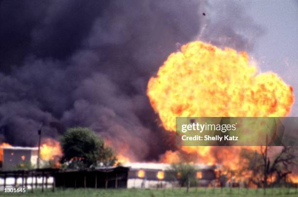 The Branch Davidian compound explodes in a burst of flames April 19 ending the standoff between cult leader David Koresh and his followers and the...